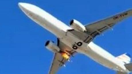 Horror moment plane's engine shoots out flames seconds after take-off