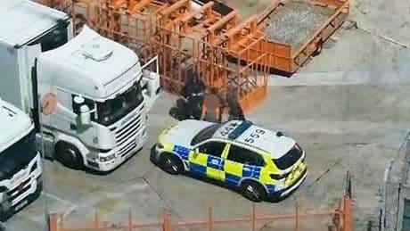 Armed police swarm man at ferry terminal after bomb scare