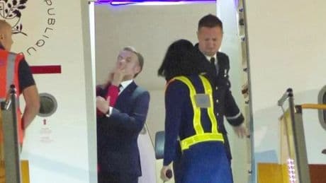 Moment Emmanuel Macron's wife slaps him as he argues during official tour