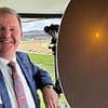 Aussie horse racing caller Darren Flindell reveals how he got caught up in Iran's missile attack on a US military base as he shares shocking video