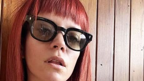 Lily Allen puts on risque display after boob job in braless selfie as she marks milestone
