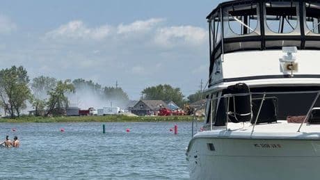 WATCH: Helicopter crashes into lake in front of busy restaurant - diners look on in horror