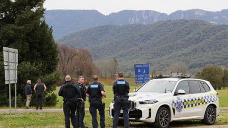 Australian police identify suspect in fatal shooting of officers as manhunt enters second day