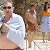Duran Duran singer Simon Le Bon, 66, enjoys a dip in the ocean alongside his swimsuit-clad wife Yasmin during luxurious holiday in France
