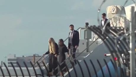 Charlie Kirk’s wife Erika clutches Usha Vance’s hand as casket arrives in Phoenix