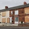 Last residents standing on ghost street full of boarded up terraces REFUSE to sell £70k homes despite council bulldozers closing in