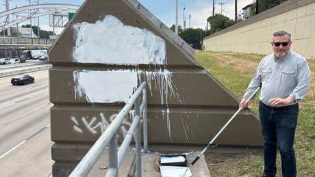 Ted Cruz paints over anti-Charlie Kirk graffiti on Texas freeway