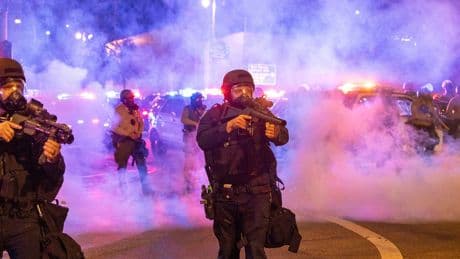 Watch: Federal agents use tear gas and flash grenades to disperse LA protesters