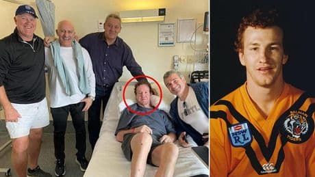 Footy great Mick Neill reveals an incurable disease has left him unable to get out of bed as his legendary teammates rally around him in hospital