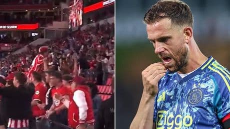 The incredible moment PSV fans discover Jordan Henderson's Ajax have CHOKED in the Dutch title race to 99th-minute equaliser