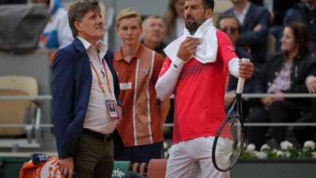 Novak Djokovic trades his racket for a bicycle and takes a nighttime ride around Paris