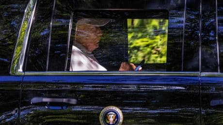 Trump Motorcade Gets A Very Blunt Message From A Lone Protester
