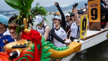 AP PHOTOS: Dragon boats thunder through Hong Kong waters to mark ancient Chinese festival