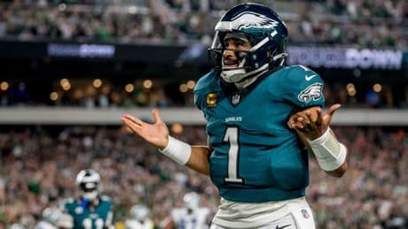 Eagles hold off Cowboys to open Super Bowl defense with thrilling win after spit drama, weather delay