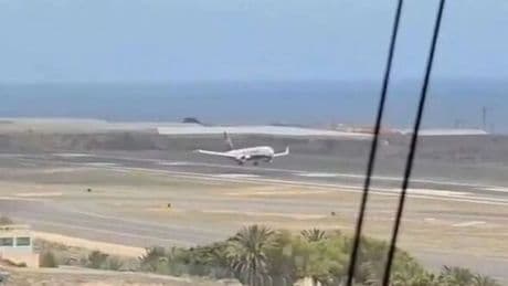 Canary Islands panic as Ryanair jet's terrifying aborted landing in storm caught on camera