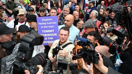 Tommy Robinson denies harassing two Daily Mail journalists