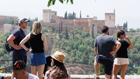 Tourists issued Spain warning with hospitals 'set to be overwhelmed'