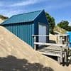 Dig this! Tiny beach hut buried deep into sand dune will set you back £150,000 - and you can't sleep there overnight