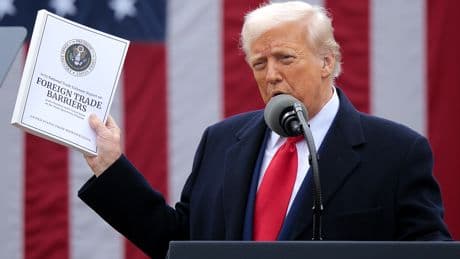 Here's a puzzling question: Why are stocks at record highs despite looming tariffs?