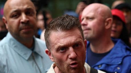 Tommy Robinson pleads not guilty to harassment just days after prison release