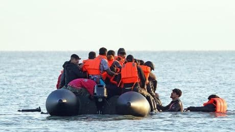 Defence chief slams 'shocking' images of smugglers picking up migrants like 'taxi'