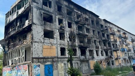 ‘Three weeks ago, this town was thriving’: Ukrainians flee the frontline in Putin’s frantic land grab