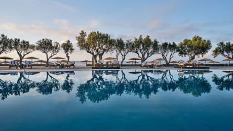 I stayed at the super relaxing Greek resort with hidden beaches, laid-back DJ tunes and private pools