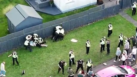 Five more people charged after angry mob clash with police in 'beast' street protest