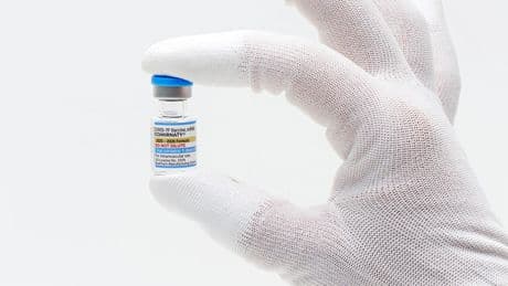 FDA approves updated COVID-19 shots but limits access for some kids and adults