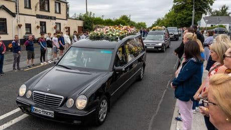 Hundreds pay respects to murdered mum and children, 13 and 14, as funeral takes place