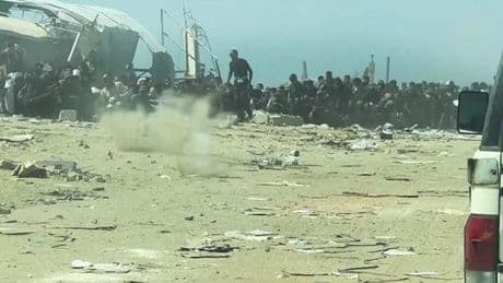BM ekibi Gazze'de yardım bekleyenlere açılan ateşi kaydetti
