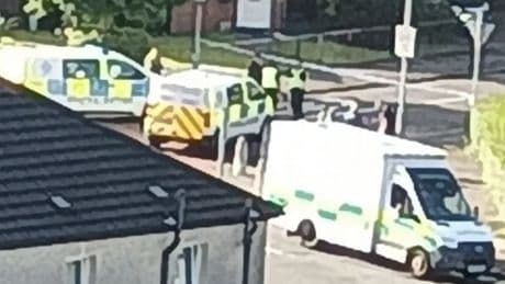 Scot cops attend 'unexplained' death as officers lock down Glasgow street