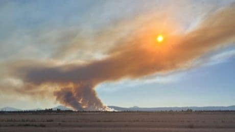 Wildfires in California and Oregon grow, prompting evacuation orders