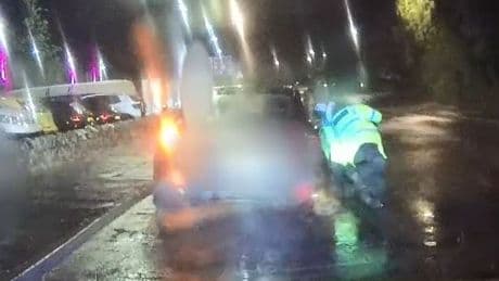 Scots mum who fled police and dragged officers along road behind her car jailed