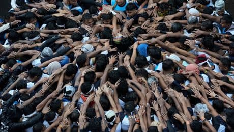 Hindus celebrate the birth of Lord Krishna in India and Nepal, in photos