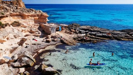 ‘Like the Caribbean’: Ibiza’s quiet little sister with lunar beaches and turquoise oceans