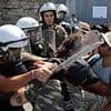 Greek riot cops clash with pro-Palestine supporters as Israeli cruise ship docks in Rhodes - days after protesters blocked its passengers from disembarking on another island