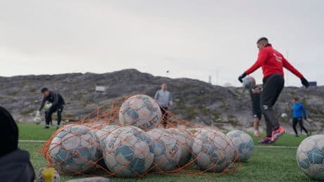 Greenland plays football all day and night in 24-hour sunlight. Now they need someone to face