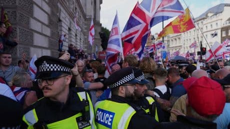 Police launch search for 11 violent disorder suspects linked to Tommy Robinson rally