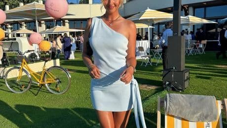 Paige Spiranac rival Sara Michelle Winter turns heads in stunning dress and heels as she catches eye on the course