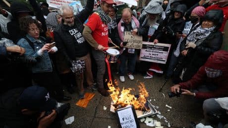 Pro-Palestine protesters burn diplomas and clash with police at Columbia graduation