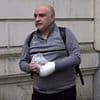 Britain risks 'reintroducing a blasphemy law' by prosecuting man, 50, who allegedly shouted 'f*** Islam' as he burned Koran outside Turkish consulate, court hears
