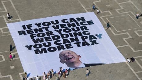 Protesters say Bezos' star-studded Venice wedding highlights growing inequality