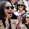 Lily Collins channels her Emily In Paris alter-ego with a chic beige look as she takes a break from filming season five to attend the 2025 French Open Men's Final at Roland Garros alongside Natalie Portman