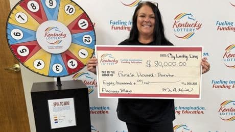Woman recovers lottery ticket she threw away and ends up winning top prize