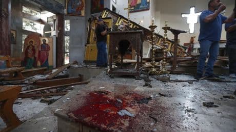 Suicide bomber kills at least 13 in Syrian church near Damascus during Mass