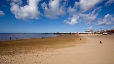 English ‘Garden town by sea’ with much quieter beach than nearby seaside resort
