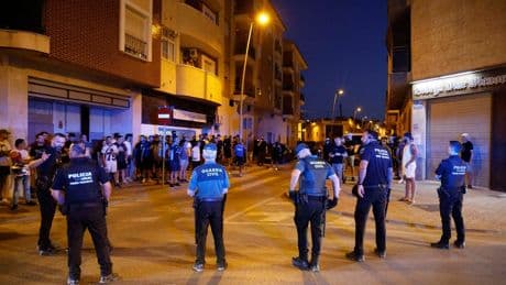 Police detain 8 people after anti-migrant clashes in Spanish town