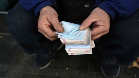 Iran's rial currency falls to near-record lows on European 'snapback' sanctions threat