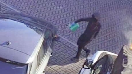 Family targeted in gang war demand to be left in peace as new images of masked hoods emerge